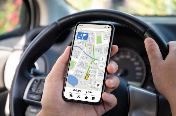 Glancing at a Map App While Holding a Phone Is “Operating” While Driving