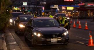 An officer asking to check a driver’s license at a DUI checkpoint is lawful                                                    